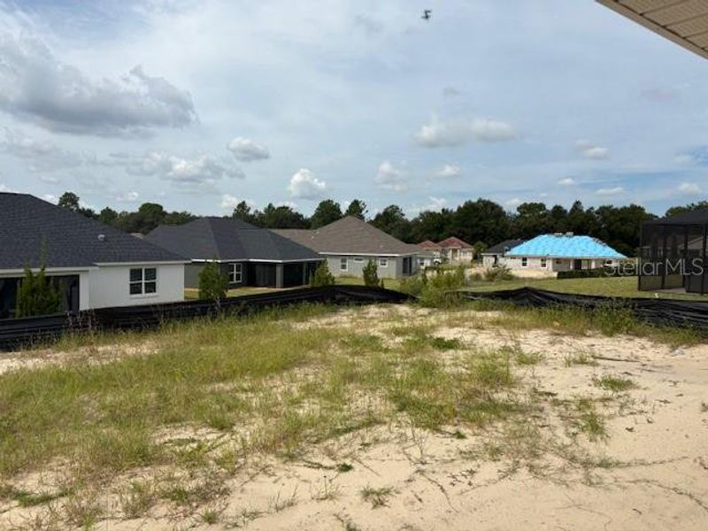 Front exterior of a new home in Juliette Falls, Dunnellon, FL, highlighting curb appeal (Image 7).