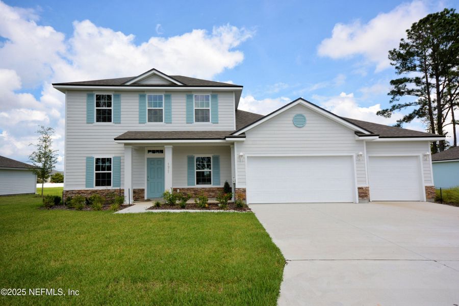 Front exterior of a new home in , Jacksonville, FL, highlighting curb appeal (Image 20).