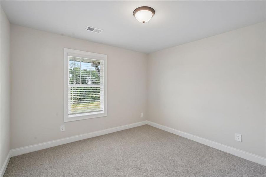 Spacious, unfurnished interior of a new home in Hemingway - Highland Series, Cumming (Image 38). Spacious, unfurnished interior of a new home in Hemingway - Highland Series, Cumming (Image 38).