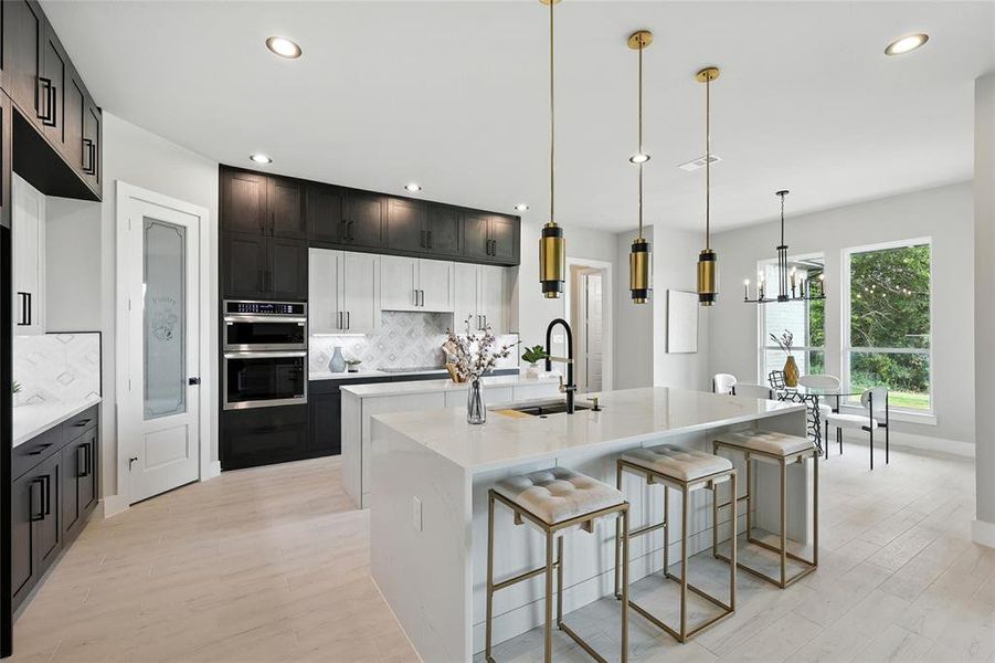 Kitchen with decorative backsplash, a kitchen island with sink, light wood-style flooring, recessed lighting, and light countertops