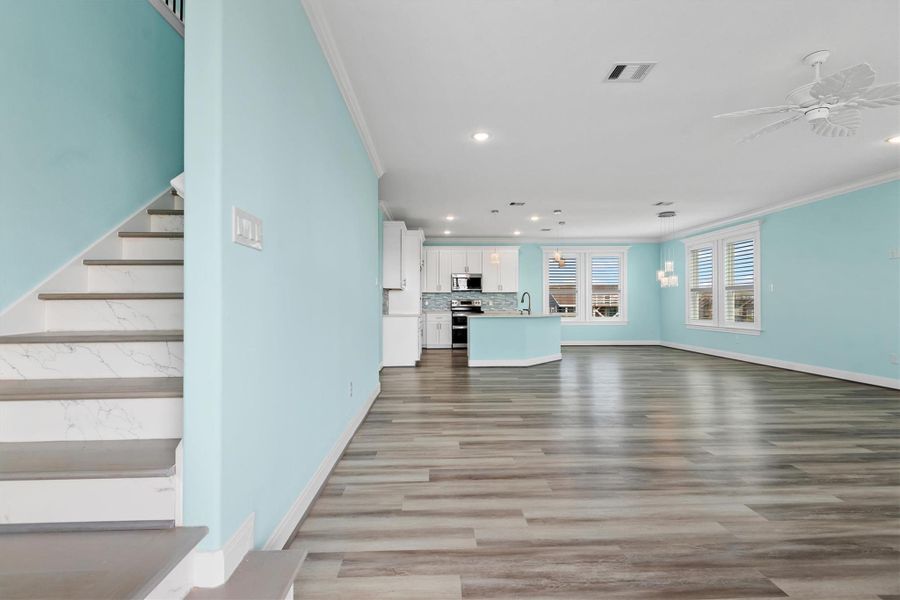 Open floor plan with custom solid stairs with quartz risers!