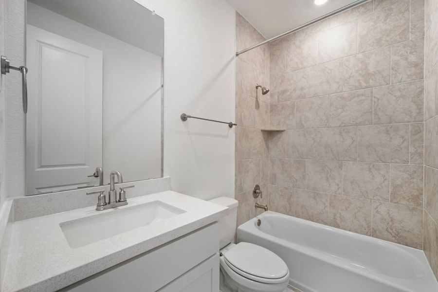 Furnished interior view inside a new home in Parkside on the River 60s, Georgetown (Image 11).