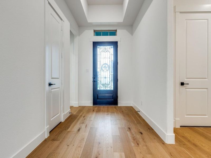 Featuring a beautiful 8' front entry door, you will enjoy welcoming friends and family into this dream home!