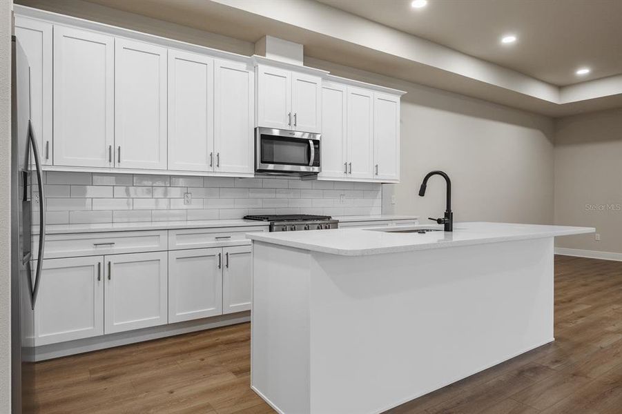 Furnished interior view inside a new home in , Clearwater (Image 12). Furnished interior view inside a new home in , Clearwater (Image 12).