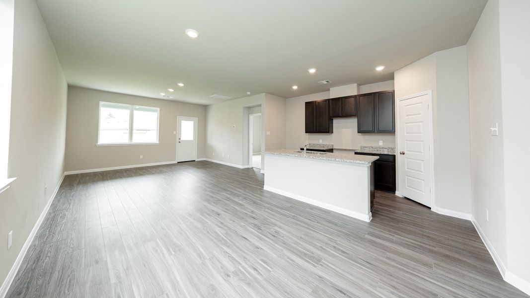 Dining Area to Kitchen and Family Room