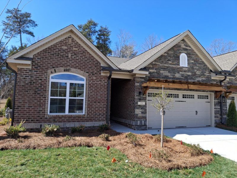 Front exterior of a new home in Weybridge, Burlington, NC, highlighting curb appeal (Image 2). Front exterior of a new home in Weybridge, Burlington, NC, highlighting curb appeal (Image 2).