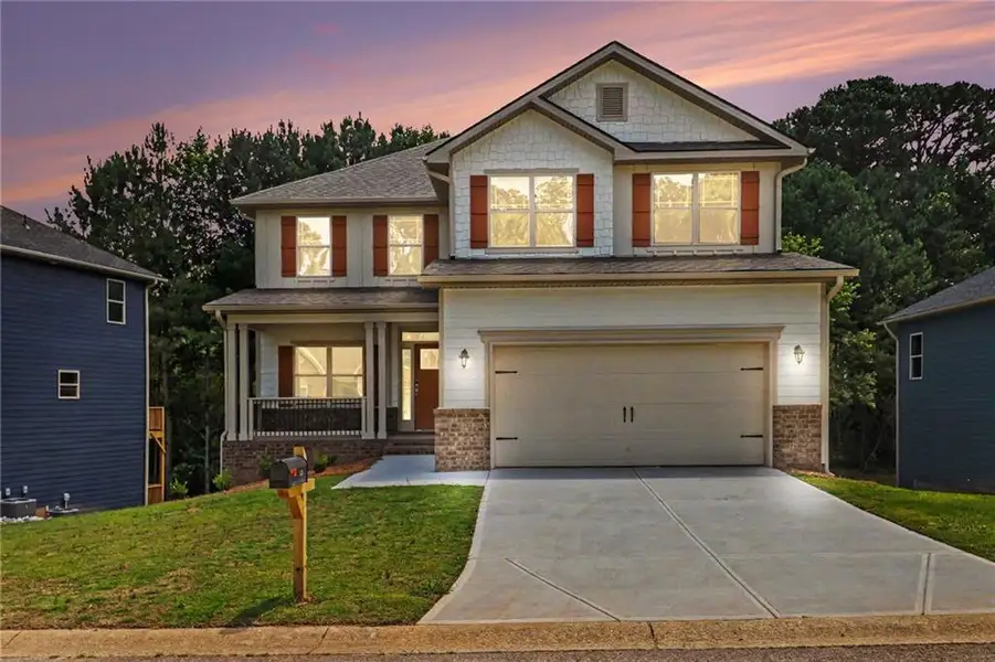 Front exterior of a new home in Magnolia Villas, Cornelia, GA, highlighting curb appeal (Image 2). Front exterior of a new home in Magnolia Villas, Cornelia, GA, highlighting curb appeal (Image 2).