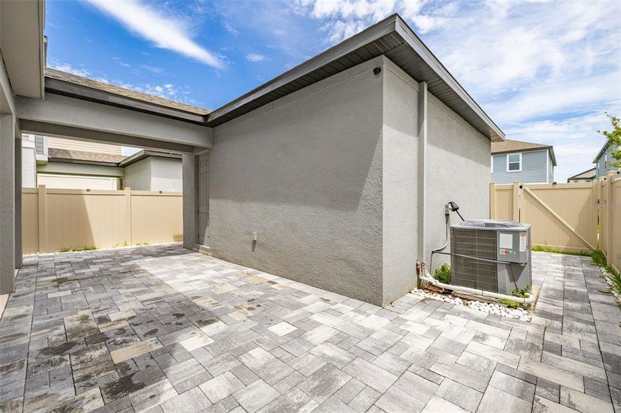 Exterior details and patio area of a home in Highland Ridge, Winter Garden (Image 30).