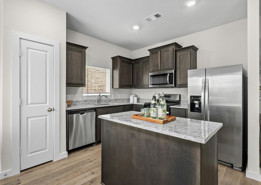 The kitchen has a convenient kitchen island.