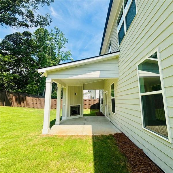 Exterior details and patio area of a home in Rosewood Lake Estates, Hoschton (Image 25). Exterior details and patio area of a home in Rosewood Lake Estates, Hoschton (Image 25).