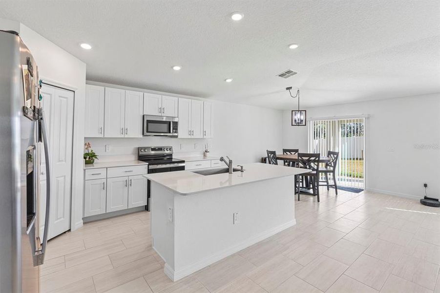 Furnished interior view inside a new home in North Park Isle: The Estates II, Plant City (Image 17). Furnished interior view inside a new home in North Park Isle: The Estates II, Plant City (Image 17).
