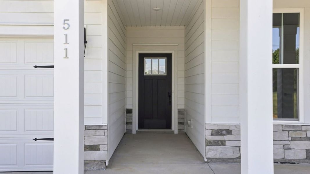 Exterior details and patio area of a home in Williams Ridge, Woodruff (Image 3).