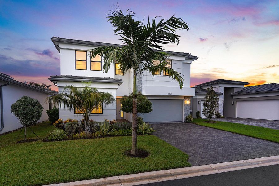 Front exterior of a new home in Lotus Edge, Boca Raton, FL, highlighting curb appeal (Image 27).