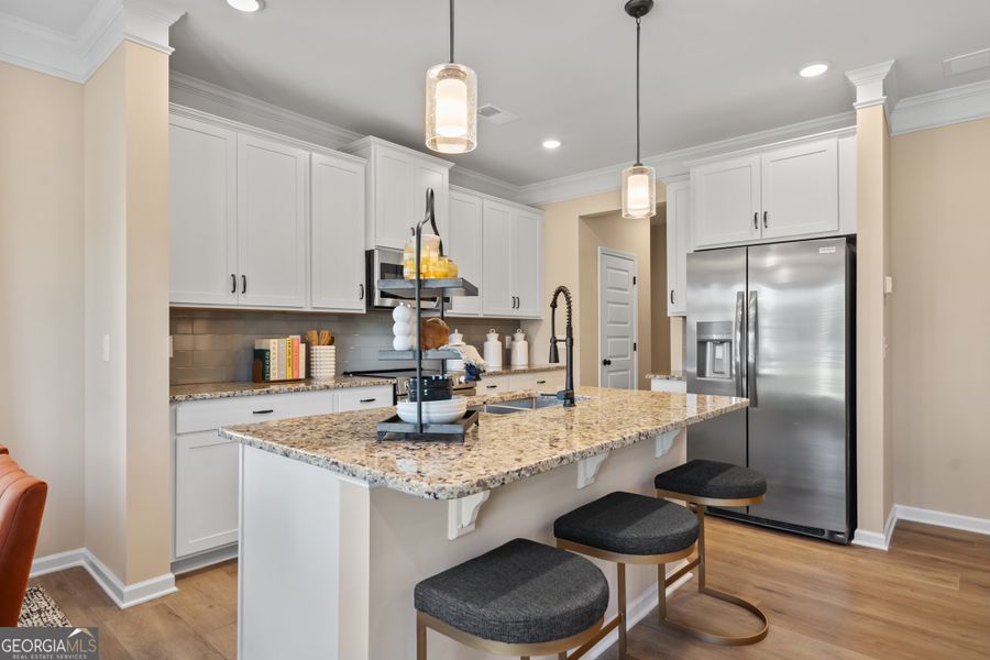 Furnished interior view inside a new home in Crescent Towns, Riverdale (Image 7).
