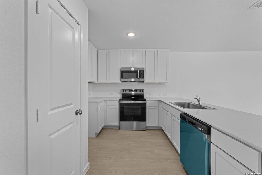 Furnished interior view inside a new home in Higdon Crossing, San Antonio (Image 10).