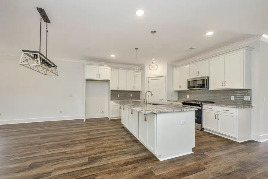 Furnished interior view inside a new home in , Ridgeville (Image 6).