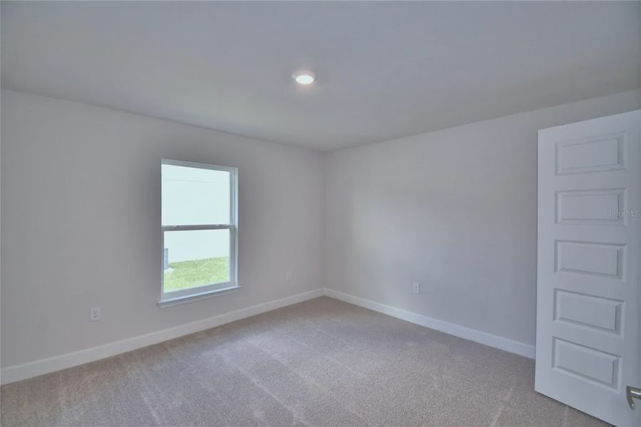 Spacious, unfurnished interior of a new home in Lake Juliana Estates, Auburndale (Image 40).