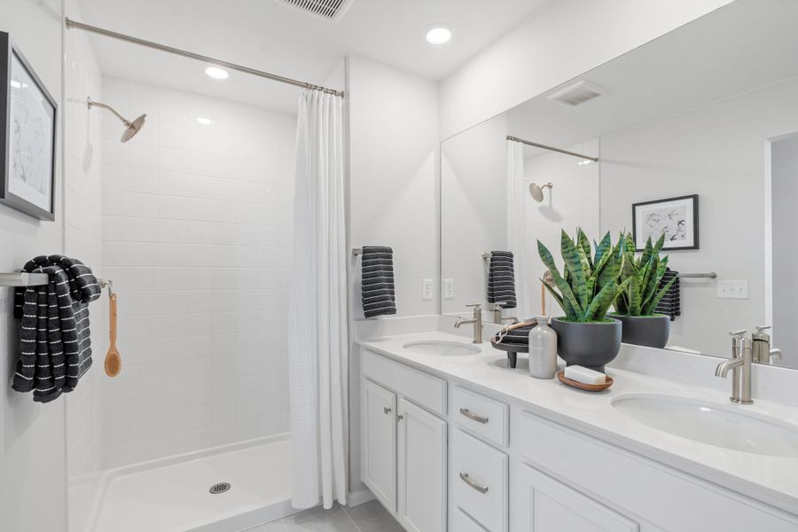 Representative furnished interior of a home built from the 2003 by Risewell Homes in Harvest Crossing, Aurora (Image 17).
