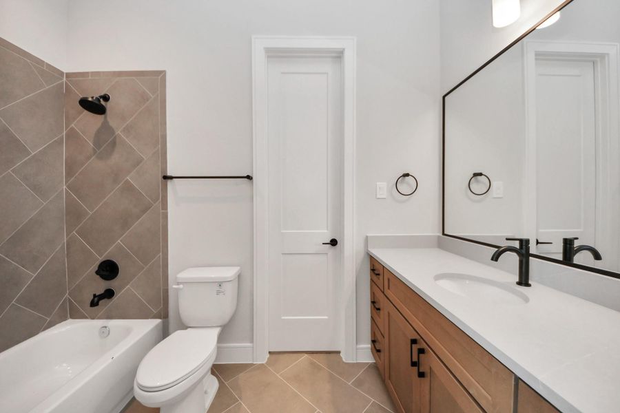 Shower & Tub combo with tile surround.