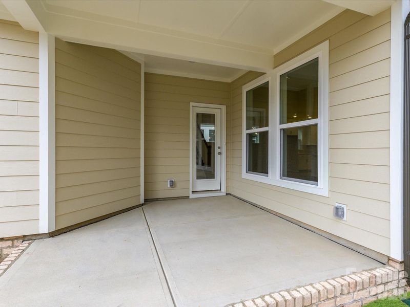 Exterior details and patio area of a home in Whitley Preserve – Park Collection, Mint Hill (Image 3).