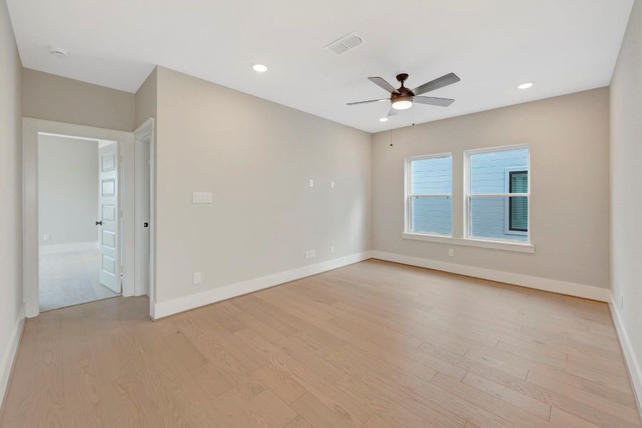 Spacious, unfurnished interior of a new home in Easthaven at Bridgeland Central - Vision Collection, Cypress (Image 26).