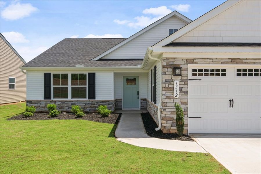 Exterior details and patio area of a home in Claiborne Ridge, Landrum (Image 2). Exterior details and patio area of a home in Claiborne Ridge, Landrum (Image 2).
