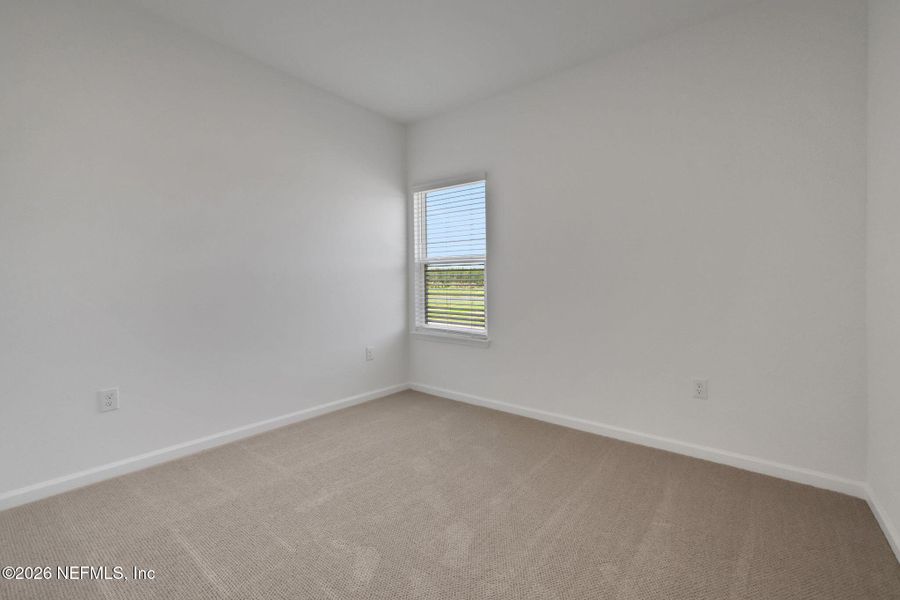 Spacious, unfurnished interior of a new home in Brook Forest, St. Augustine (Image 24).