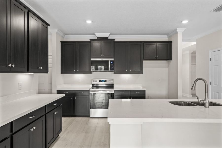 Furnished interior view inside a new home in Windswept Estates, Freeport (Image 6).