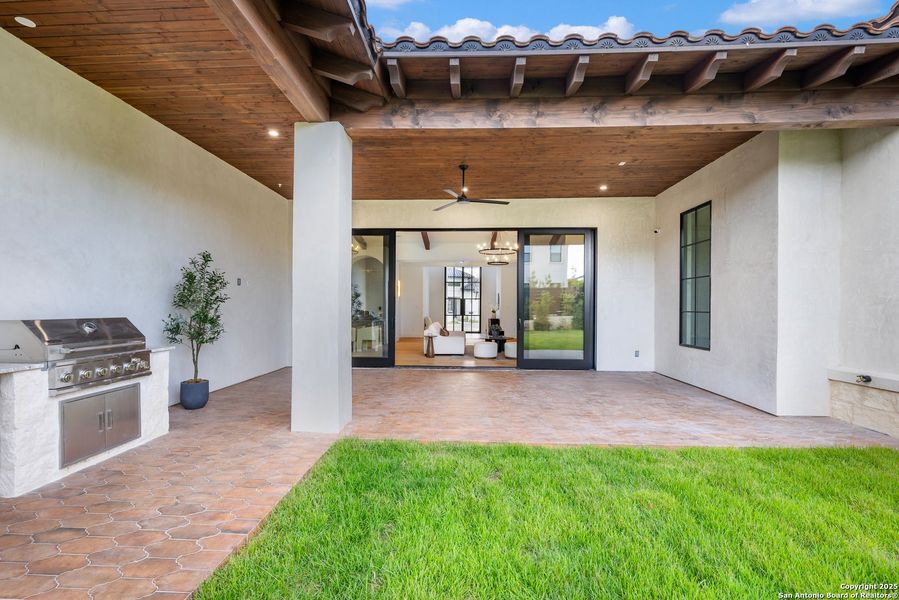 Exterior details and patio area of a home in , San Antonio (Image 24).