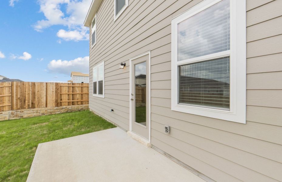 Exterior details and patio area of a home in Sunfield, Buda (Image 25).
