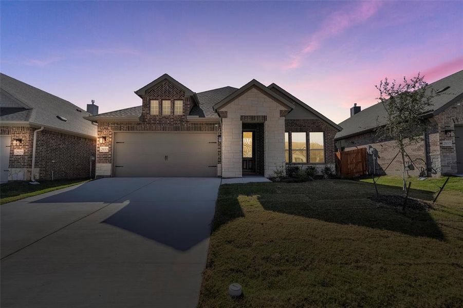 Front exterior of a new home in Northstar, Haslet, TX, highlighting curb appeal (Image 25).