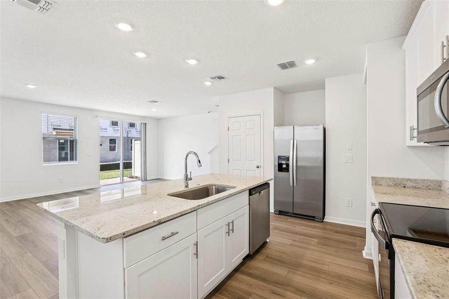 Furnished interior view inside a new home in The Meadow at Crossprairie Townes, St. Cloud (Image 7).