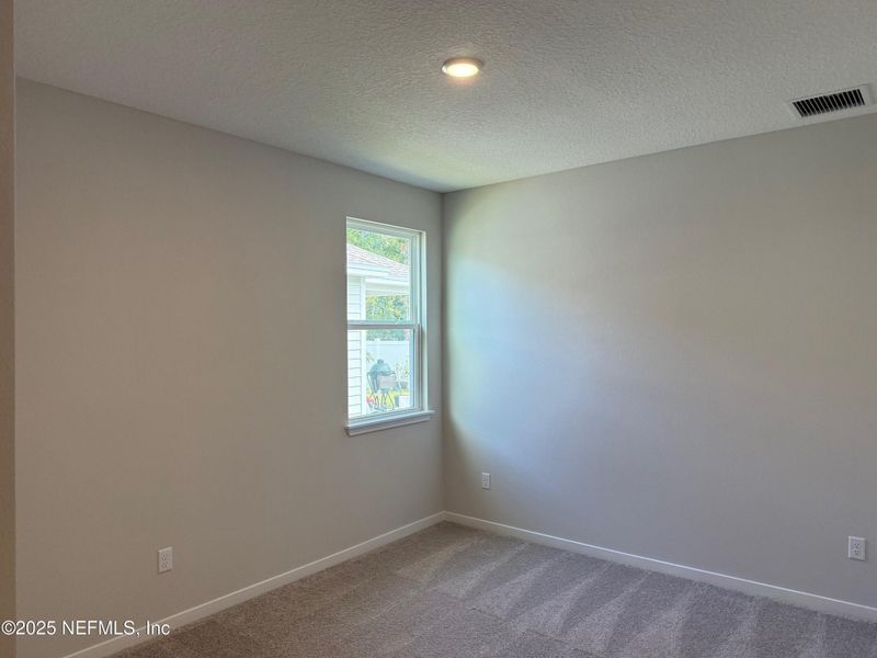 Spacious, unfurnished interior of a new home in The Preserve at Concourse Crossing, Fernandina Beach (Image 12).