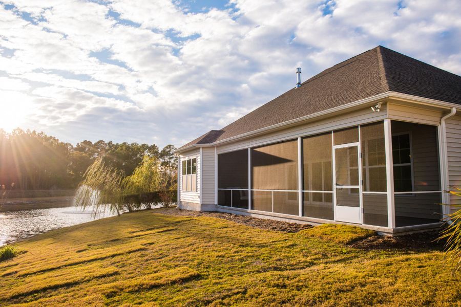 Representative exterior photo of a completed home built from the Ansley by Bill Clark Homes in The Sanctuary at Sunset Beach, Sunset Beach, NC (Image 26).