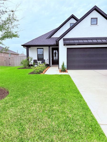 Front exterior of a new home in , Richmond, TX, highlighting curb appeal (Image 20).