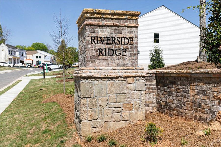 Front exterior of a new home in Riverside Ridge, Lawrenceville, GA, highlighting curb appeal (Image 24).