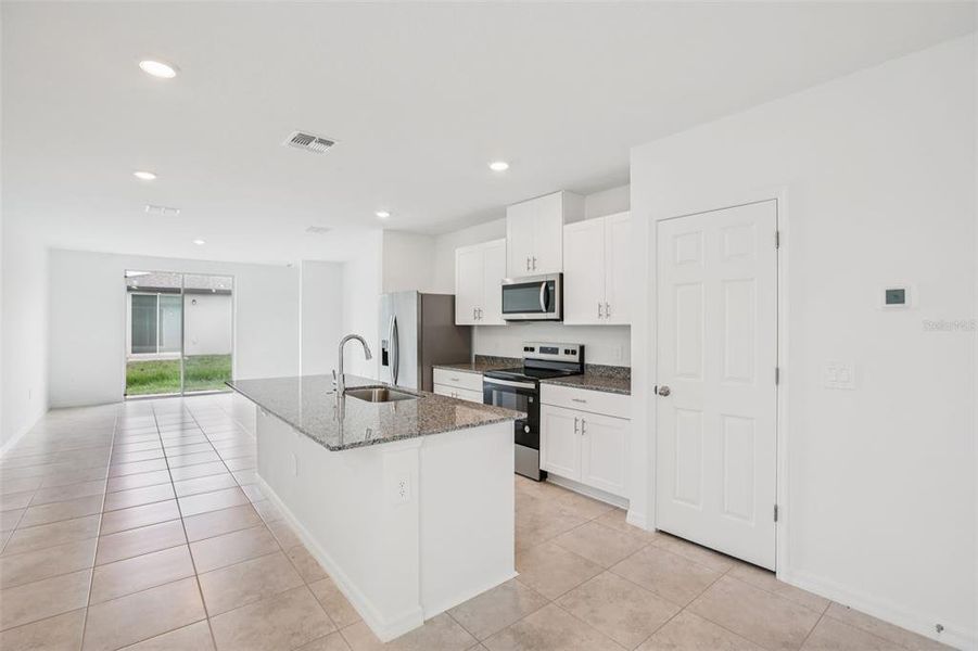 Furnished interior view inside a new home in Villamar - Classic Series, Winter Haven (Image 7).