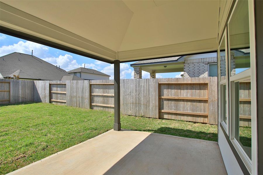 Exterior details and patio area of a home in Sunterra, Katy (Image 3).