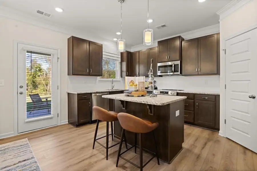 Furnished interior view inside a new home in Allen Manor, Hoschton (Image 3).