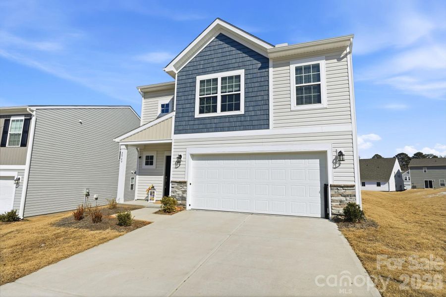 Front exterior of a new home in Legacy Ridge, Catawba, NC, highlighting curb appeal (Image 24).