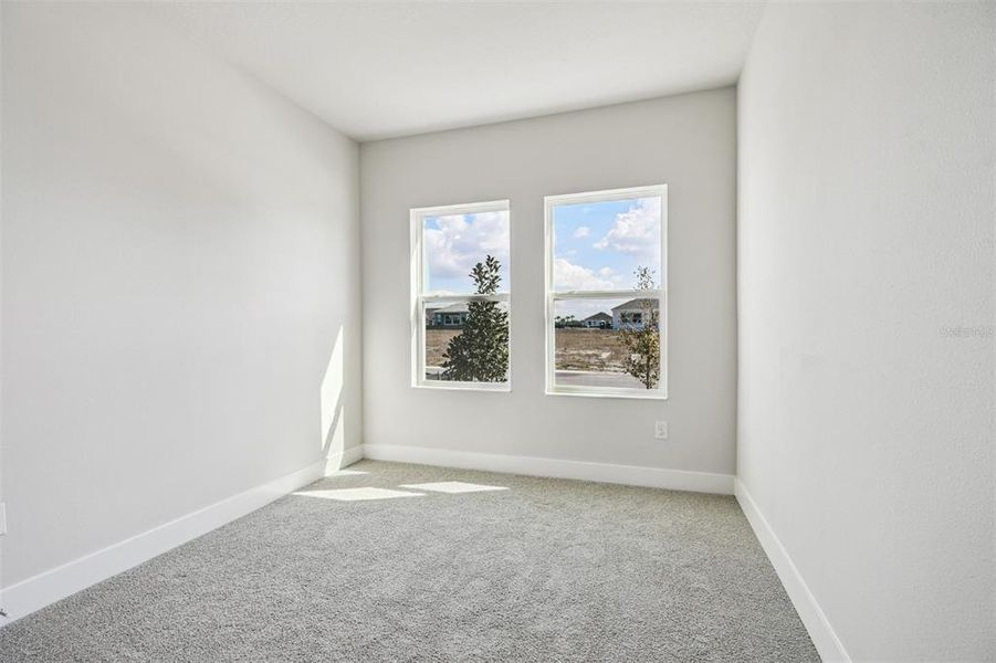 Spacious, unfurnished interior of a new home in Waterset Tradition Series, Apollo Beach (Image 31).