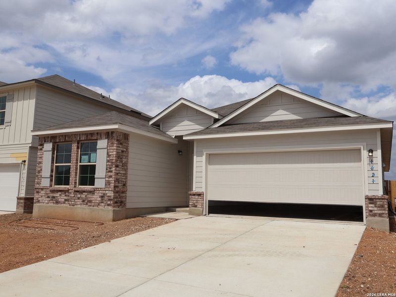 Front exterior of a new home in Meadows at Clear Springs, New Braunfels, TX, highlighting curb appeal (Image 20).