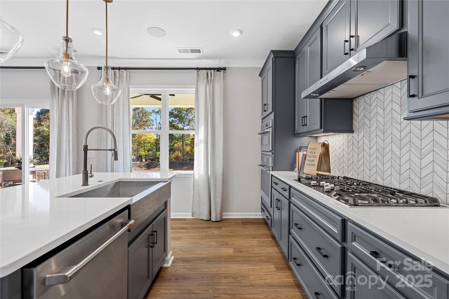 Large windows let light into the space and keep costs low with energy efficiency.