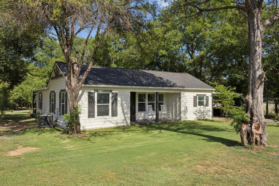 Front exterior of a new home in , Weatherford, TX, highlighting curb appeal (Image 2).