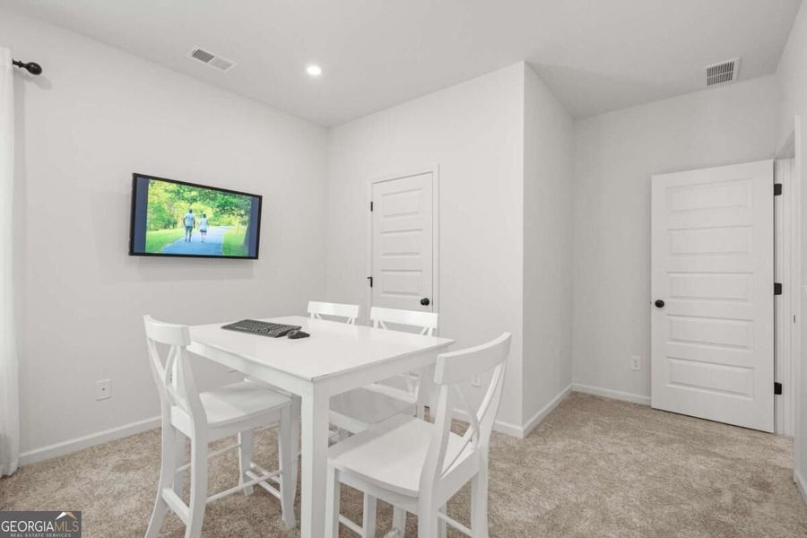 Furnished interior view inside a new home in Cobblestone Crossing Commons, Byron (Image 28).