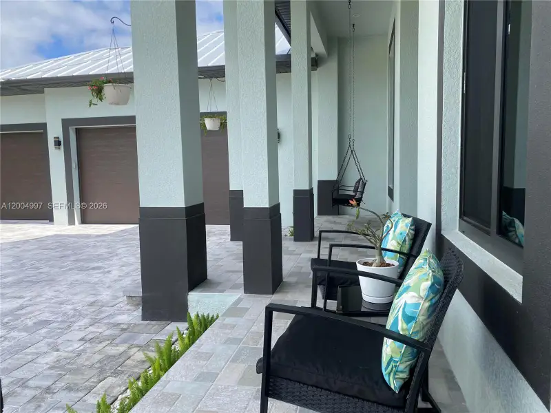 Exterior details and patio area of a home in , Naples (Image 24).