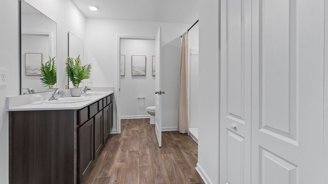 Representative furnished interior of a home built from the HAYDEN by D.R. Horton in Rookery, Green Cove Springs (Image 16).
