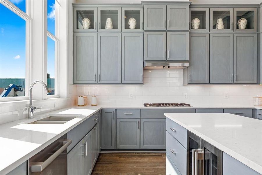 Image of model home with similar floorplan.