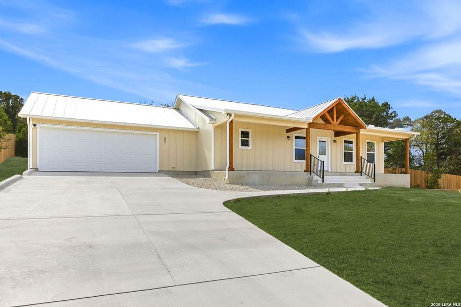 Front exterior of a new home in , Fischer, TX, highlighting curb appeal (Image 29).