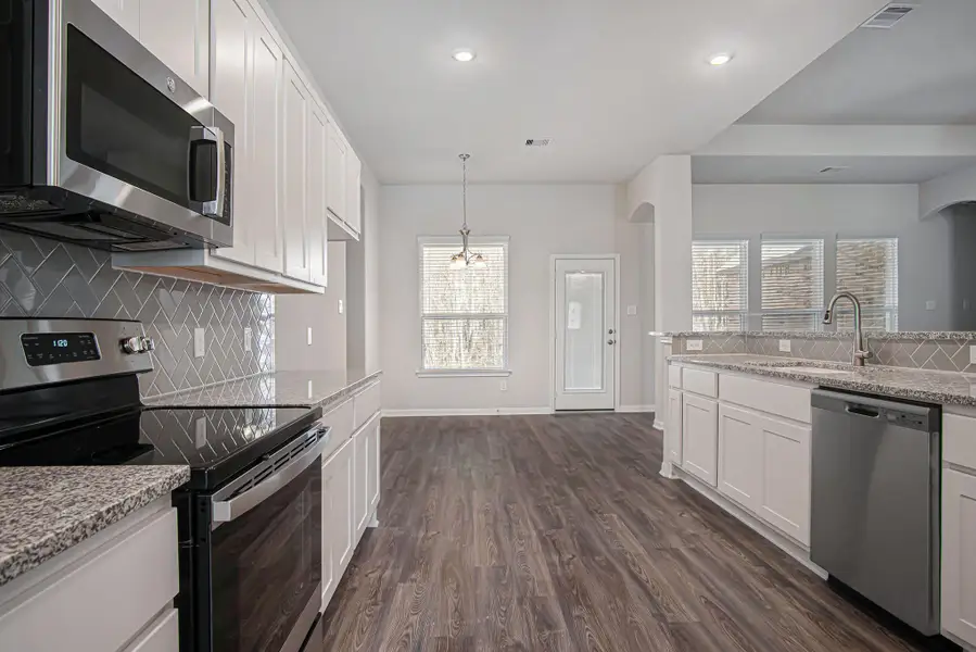 Stunning Brand New 1 Story home with side load garage! Gorgeous curb appeal! Pictures are representation of the  Dallas Plan. Colors and selections may vary.  Home is under construction with approx. July 15 2026 completion. Hurry Call Today!